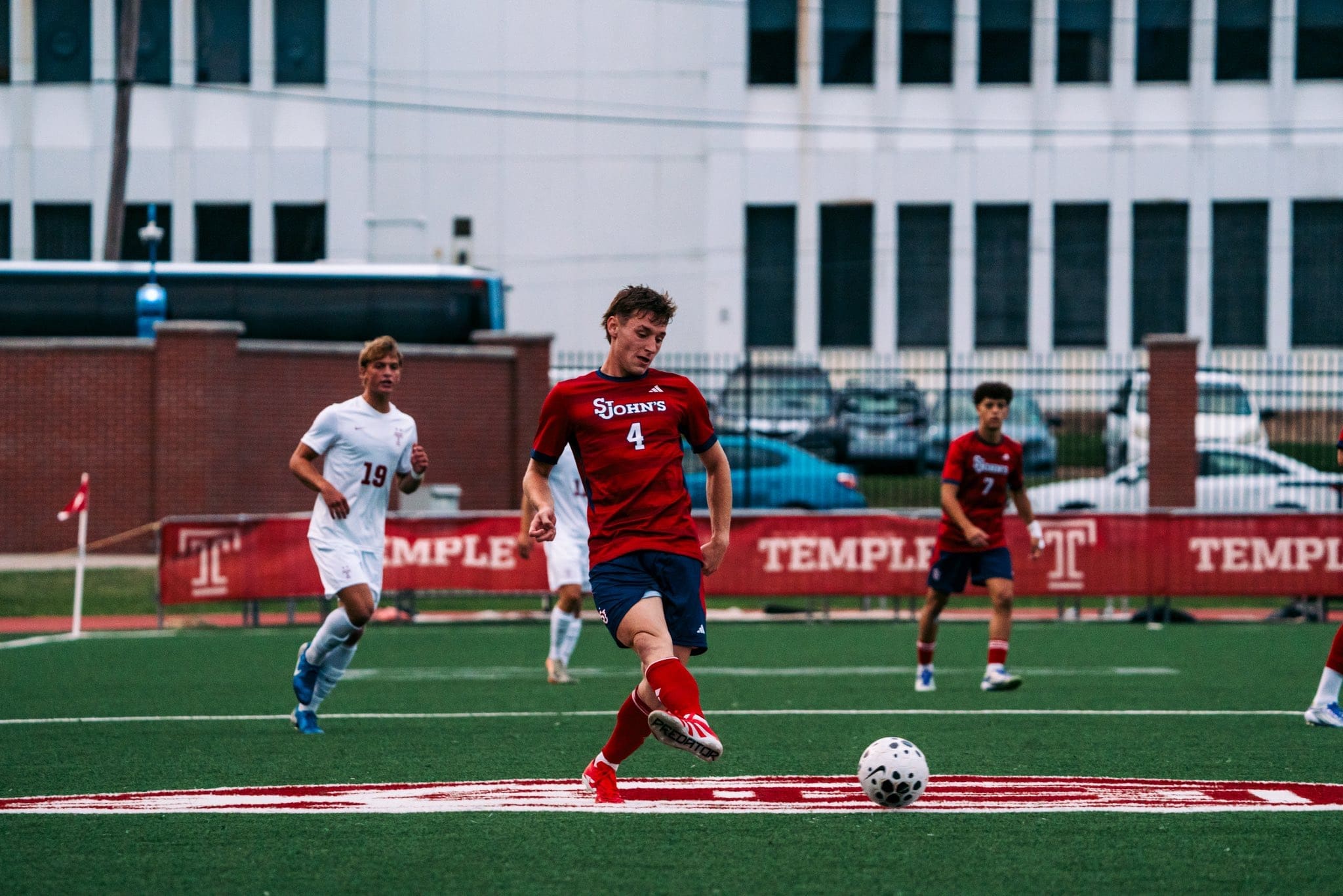 St. John's Red Storm midfielder Markus Pusztahegyi (#4) controls the ball during 1-0 victory over Temple Owls at Temple Sports Complex