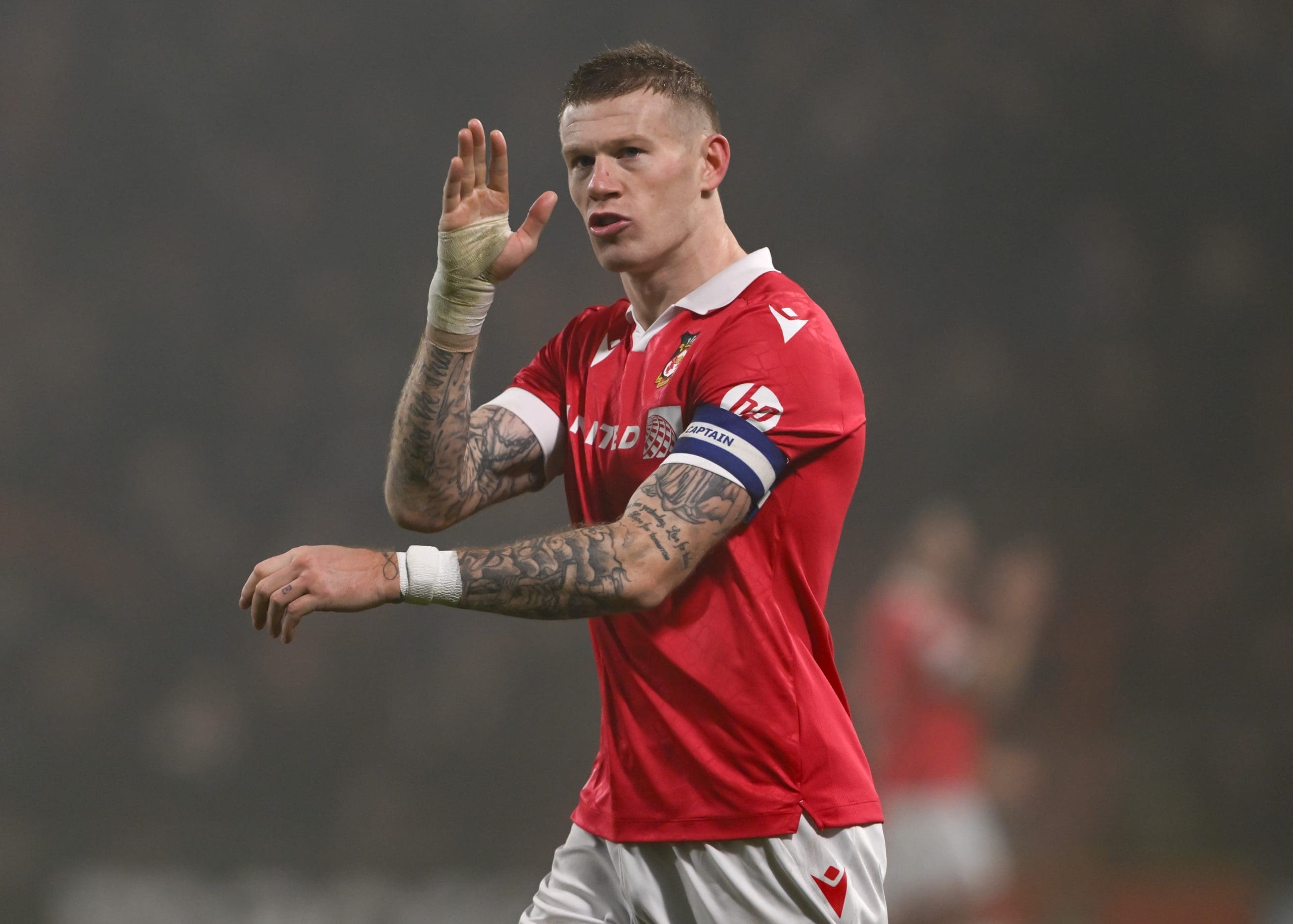 James McClean in Wrexham AFC red jersey celebrating during match