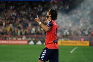 New England Revolution's Leo Campana (3) celebrates goal with arms raised at Gillette Stadium during MLS match.