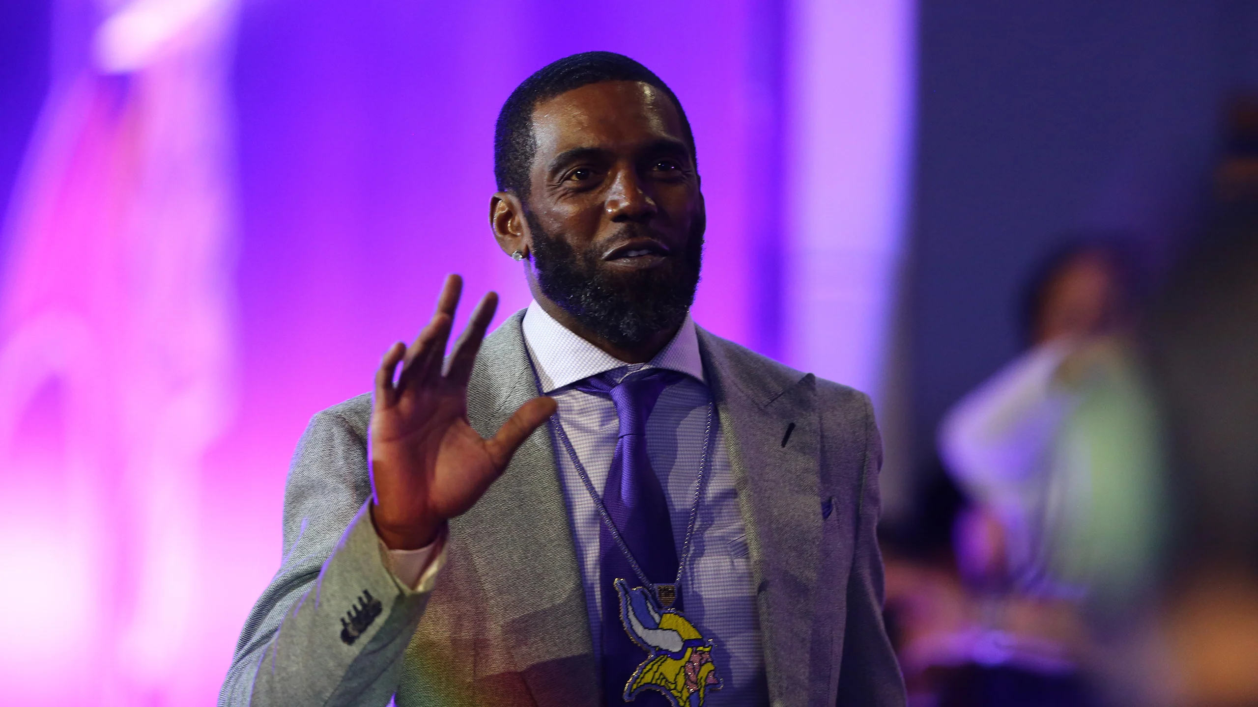Randy Moss in Minnesota Vikings purple jersey smiling during Sunday NFL Countdown appearance on ESPN