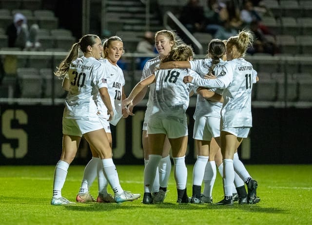 Army West Point women's soccer team celebrates together in huddle after Sophia Henry's second-half goal against Loyola on October 24, 2025