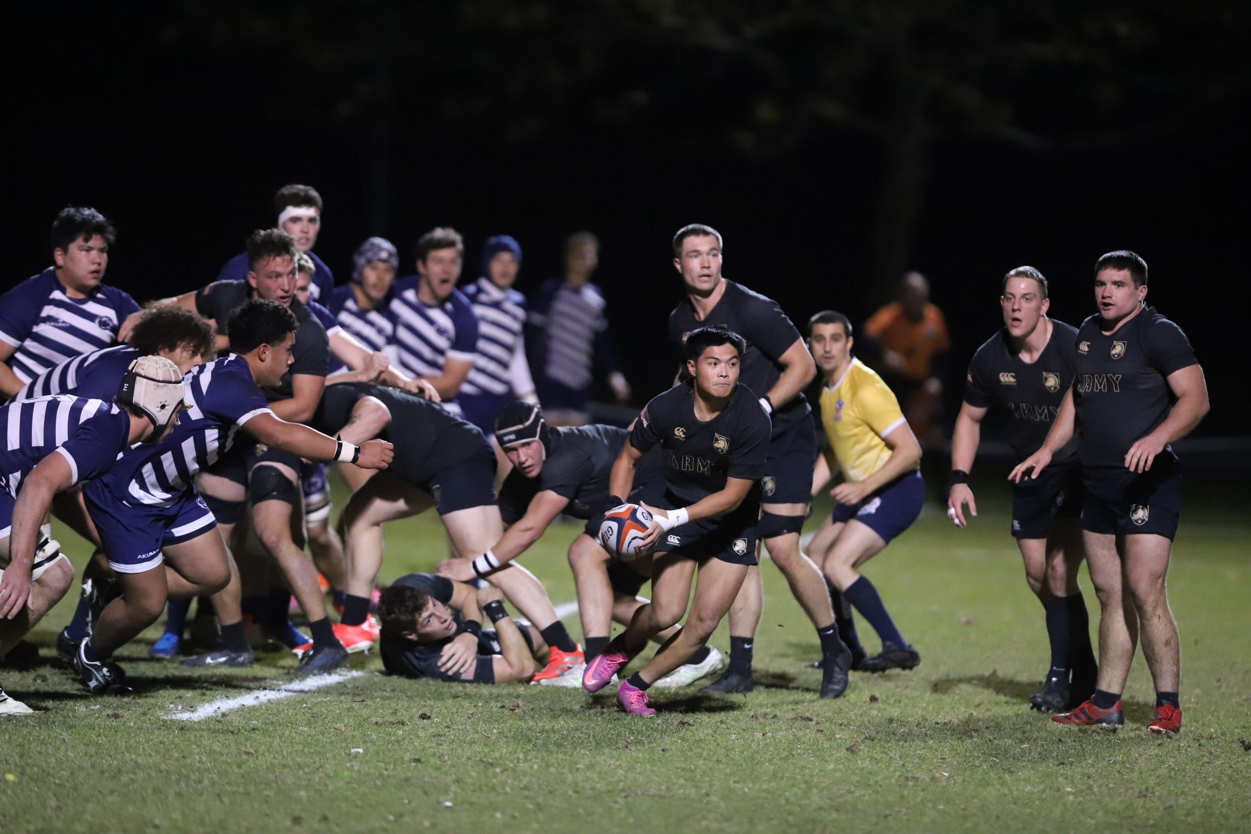 Army West Point rugby scrum-half Isaac Gamboa pitches the ball to a teammate during the Black Knights' 55-14 victory over Penn State at Warrior Field in West Point, New York