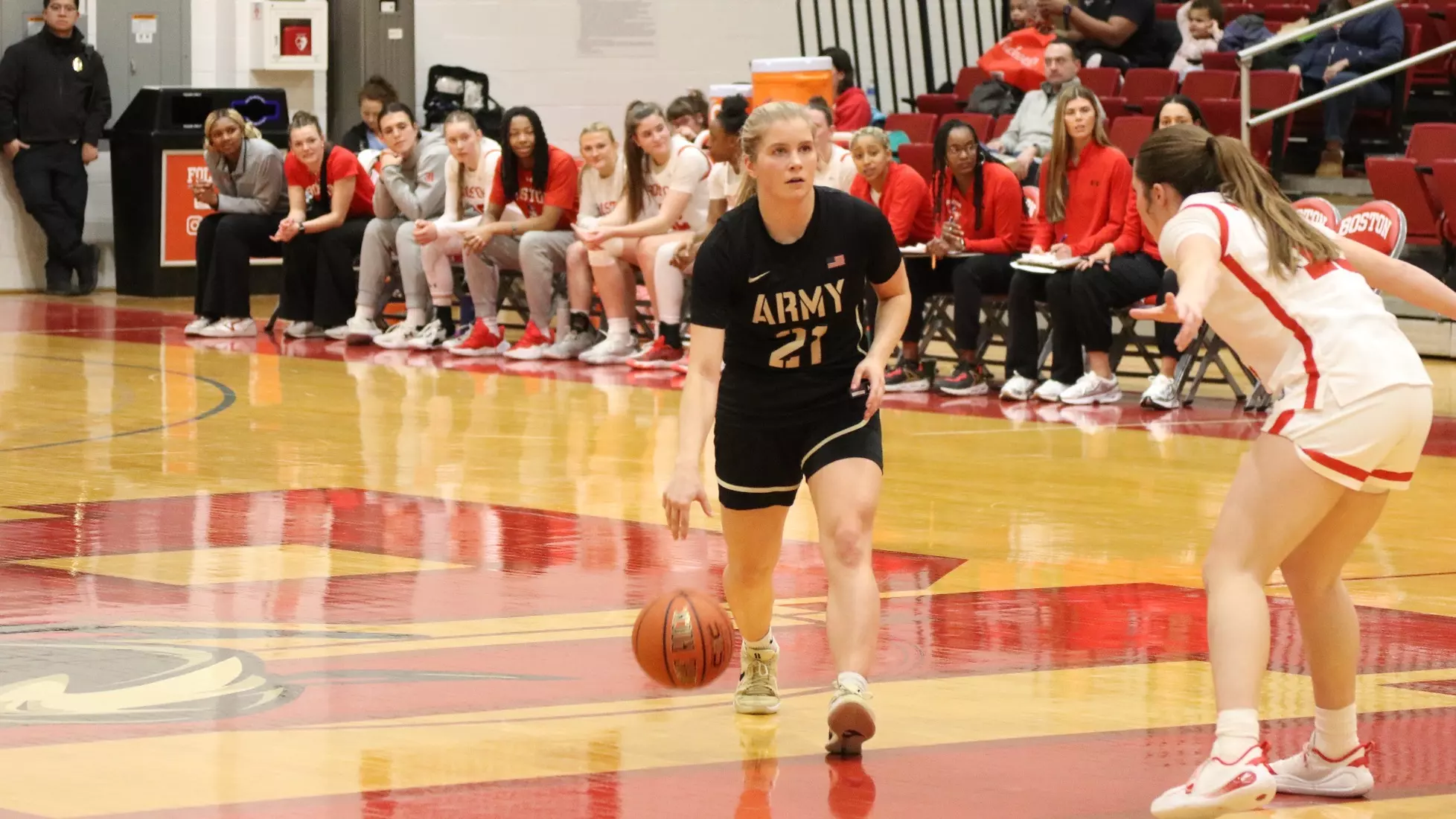 Army’s Reese Ericson dribbles in the half court while Boston University sets its defense during the Black Knights’ road win at Case Gym.