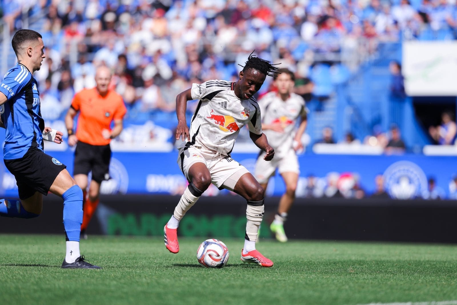 Ronald Donkor has the ball on the pitch