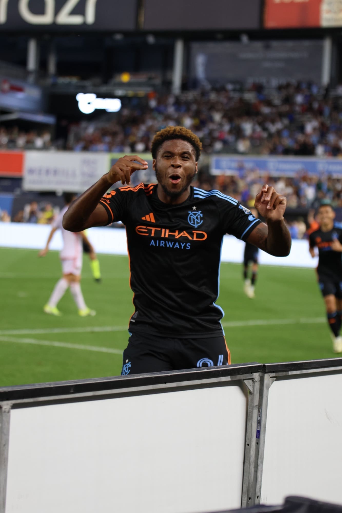 Tayvon Gray Celebrating after his pass leads to a goal for New York.