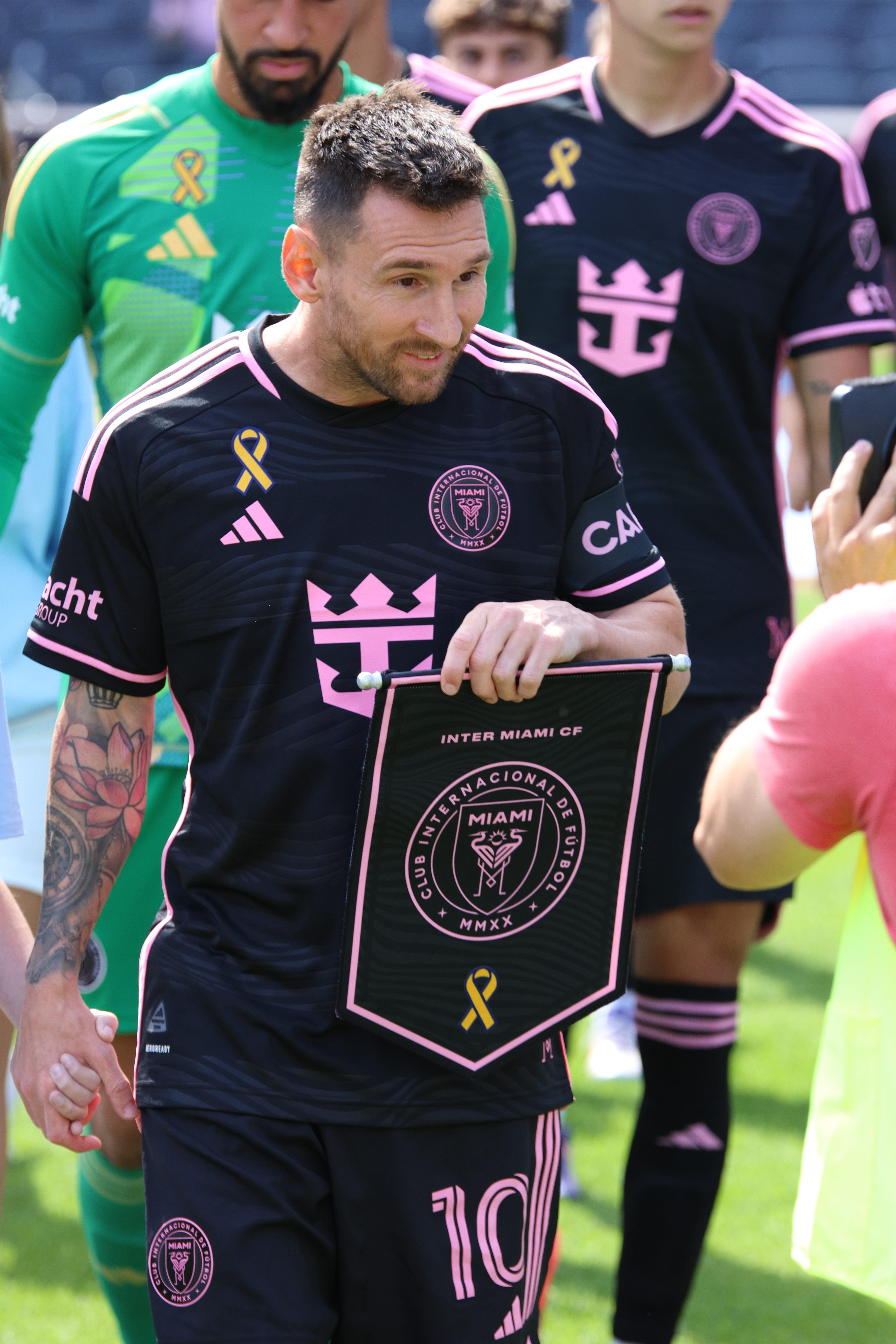 Leo Messi starting XI walk out at Yankee Stadium.
