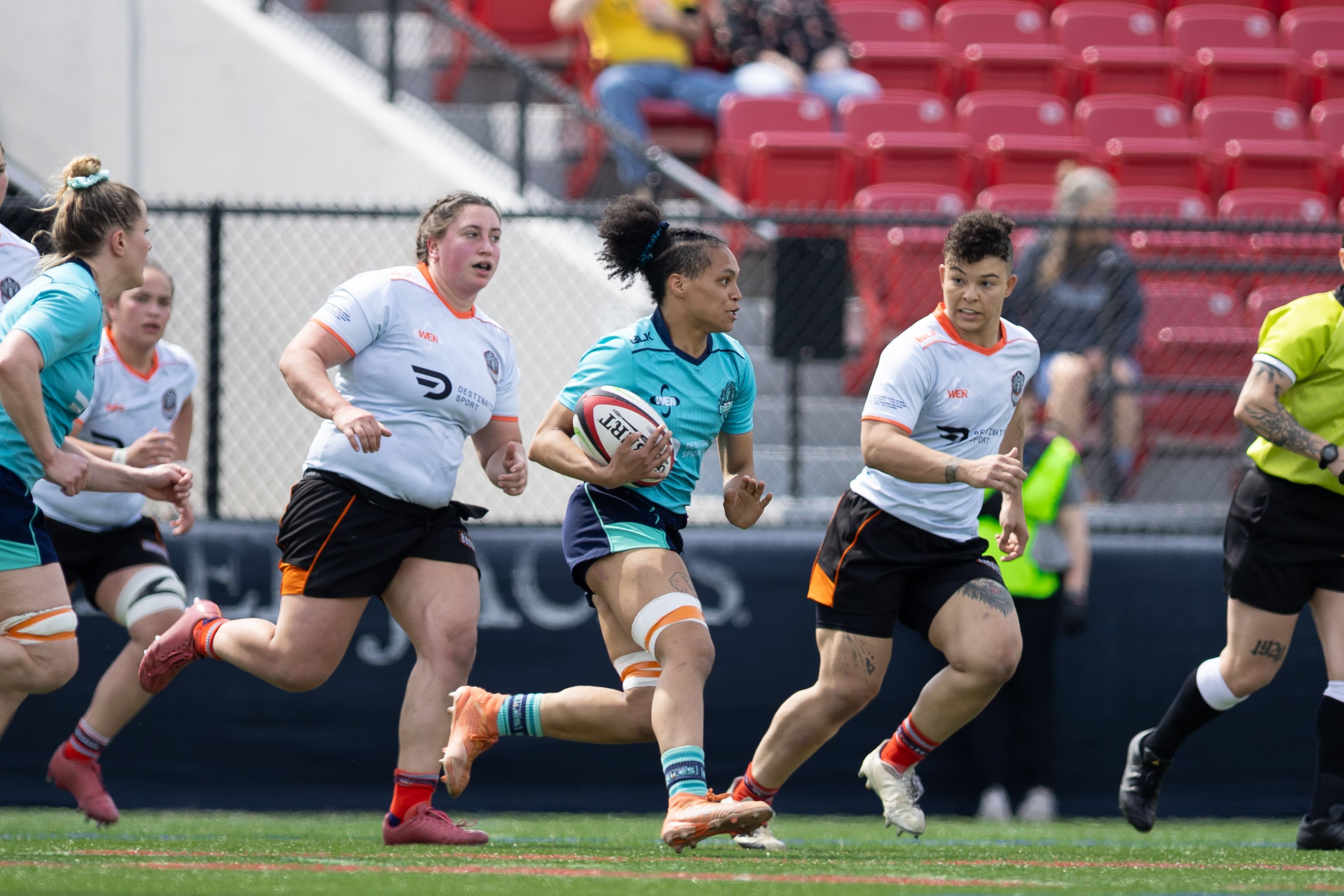 Exiles flanker Gio Cruz carries the ball upfield. Photo by Ali Tousignant via alitousiphotos.com.