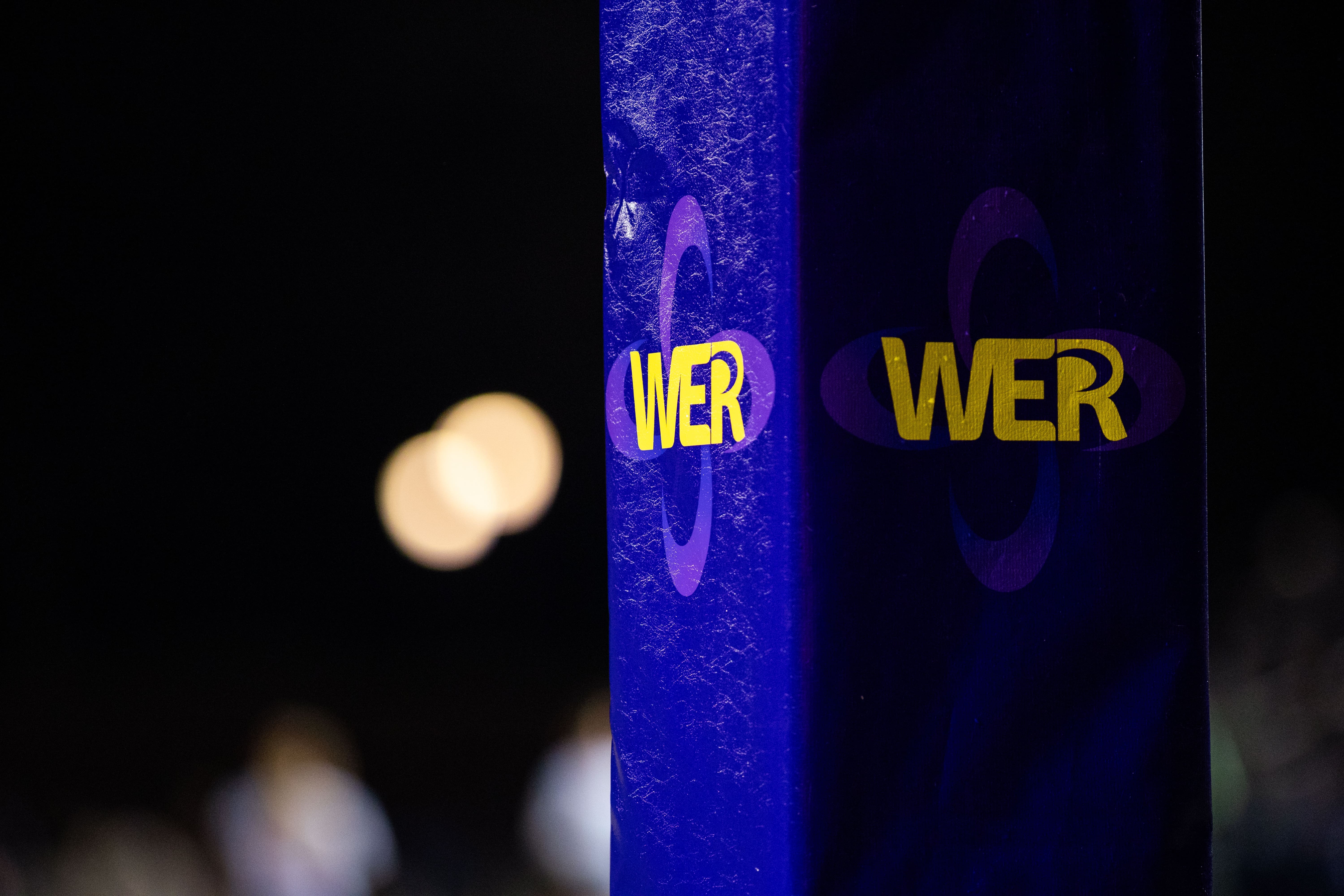 The Women's Elite Rugby logo on a stadium stanchion. Photo by Ali Tousignant via alitousiphotos.com.