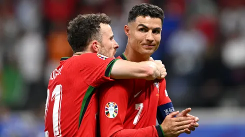 7/3/25 Doja hugging Ronaldo after a huge win last year. Mandatory Credit: Portugal National Team