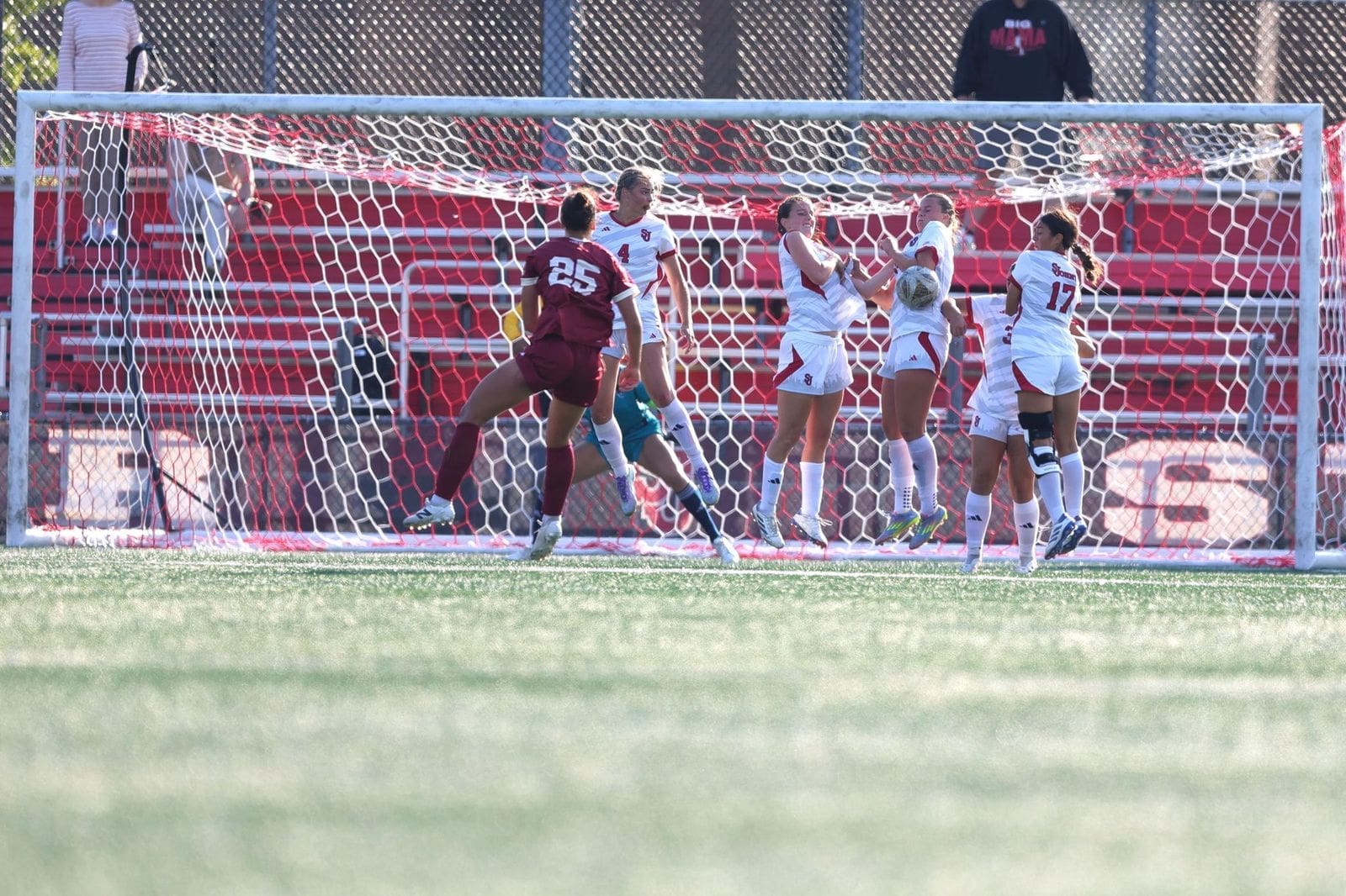 St. John's University women's soccer defenders block a shot on goal against Boston College during their scoreless draw at Cox Family Field at Belson Stadium