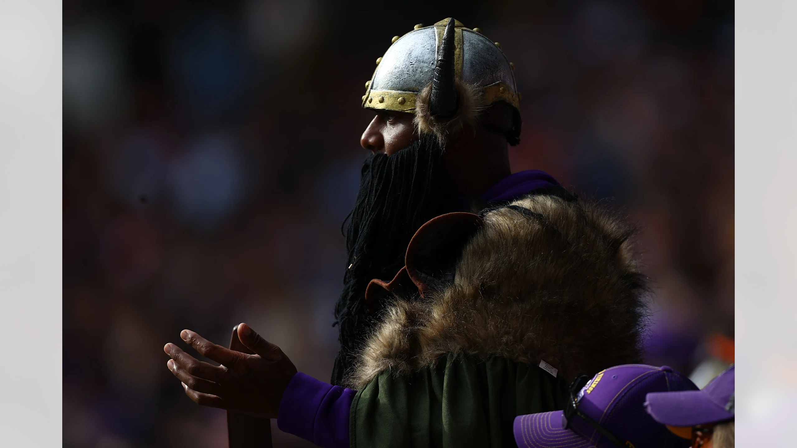 Minnesota Vikings fan dressed in full Viking warrior costume with horned helmet and armor cheers in the crowd during the Vikings' 21-17 victory over the Cleveland Browns at Tottenham Hotspur Stadium in London on October 5, 2025