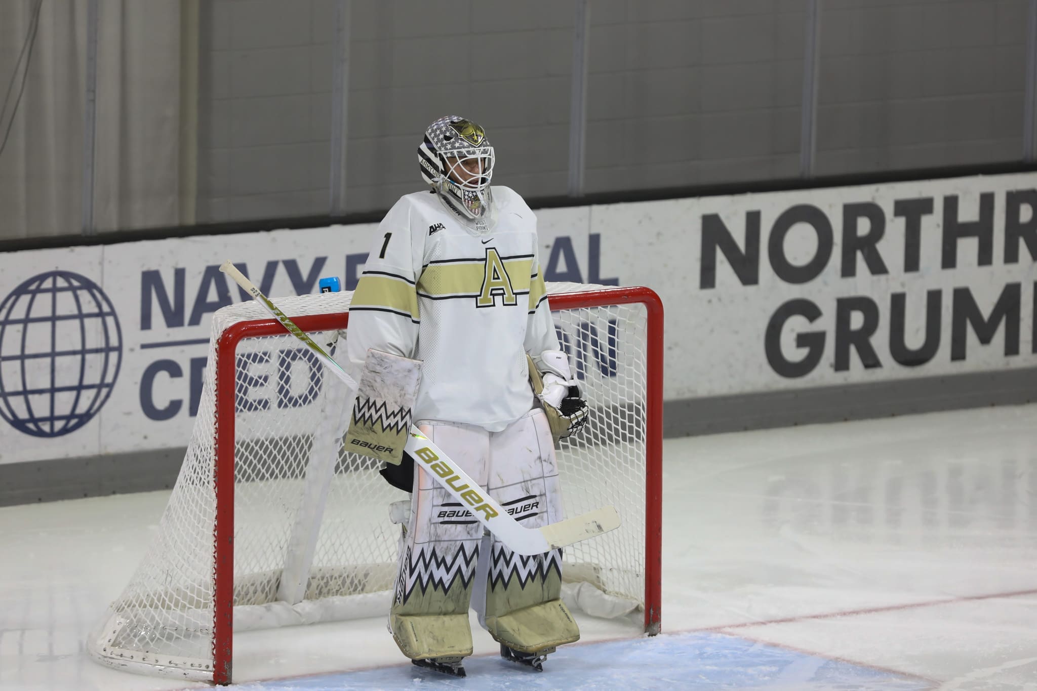 Army goaltender Jacob Biron stands ready in net during Army's 5-4 upset win over No. 17 UMass at Tate Rink