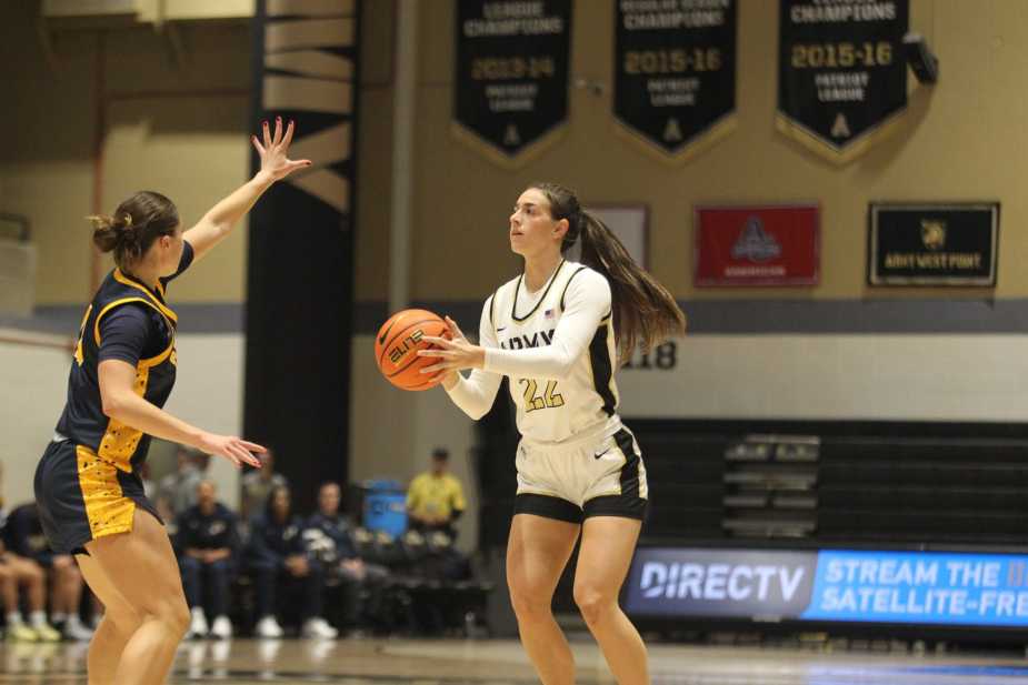 Army junior forward Taylor Wilson shooting a three-pointer during game against Pace University