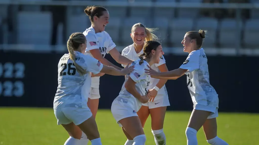 Army West Point women's soccer players celebrate together after their 3-1 victory over Loyola Maryland in the Patriot League Playoffs first round at Malek Stadium