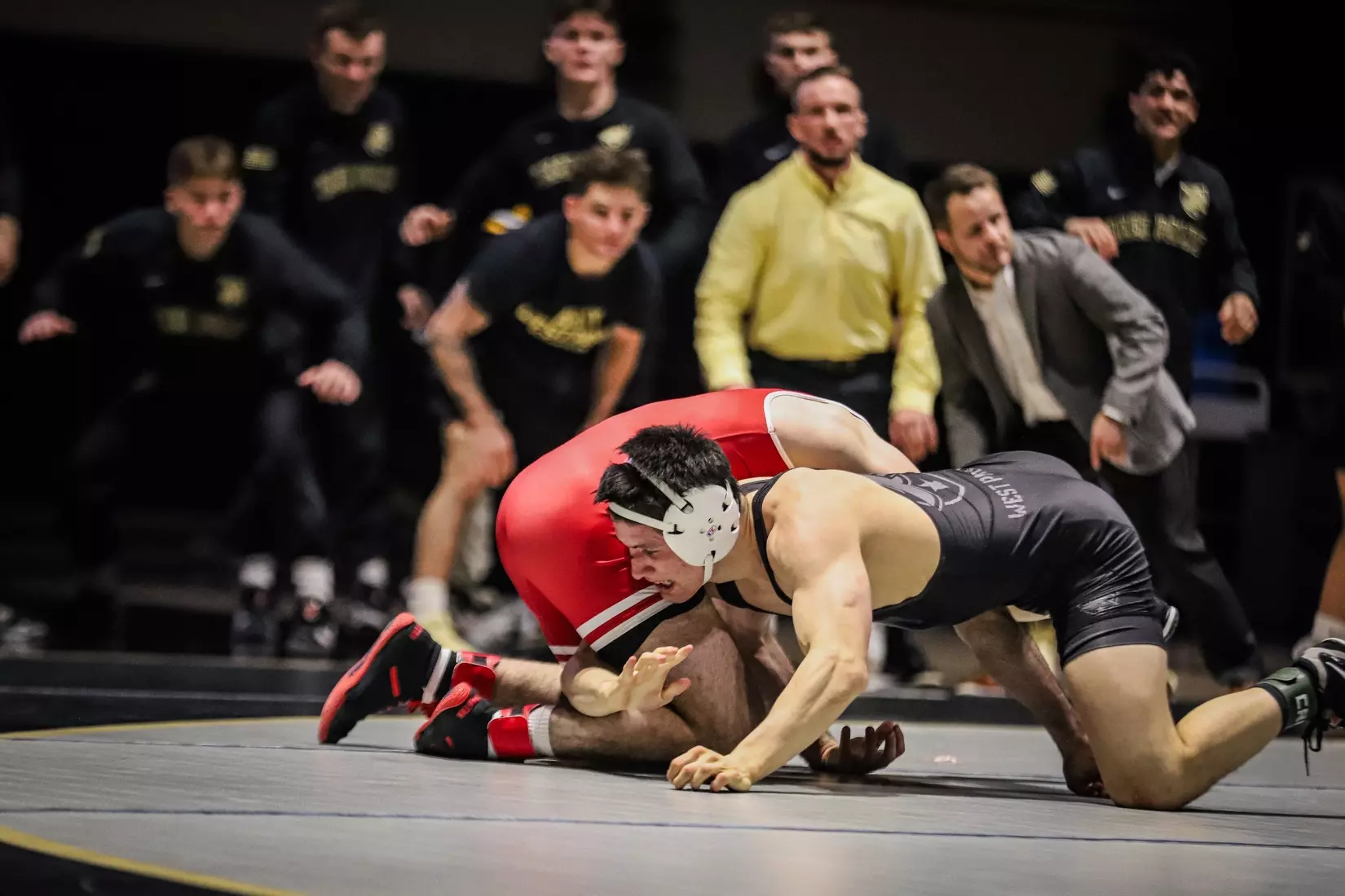 Army West Point wrestler Ethan Berginc celebrates after defeating No. 3 Zan Fuggit of Wisconsin in sudden victory at Christl Arena on December 6, 2025.