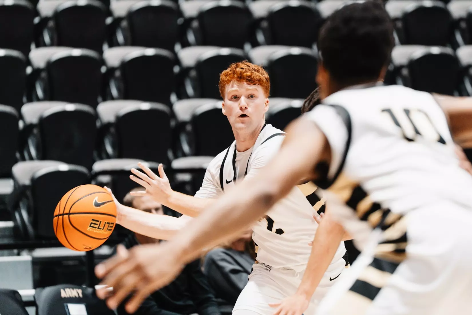 Army Black Knights guard Ryan Curry prepares to pass the basketball during game action. Mandatory Credit: Army Athletics