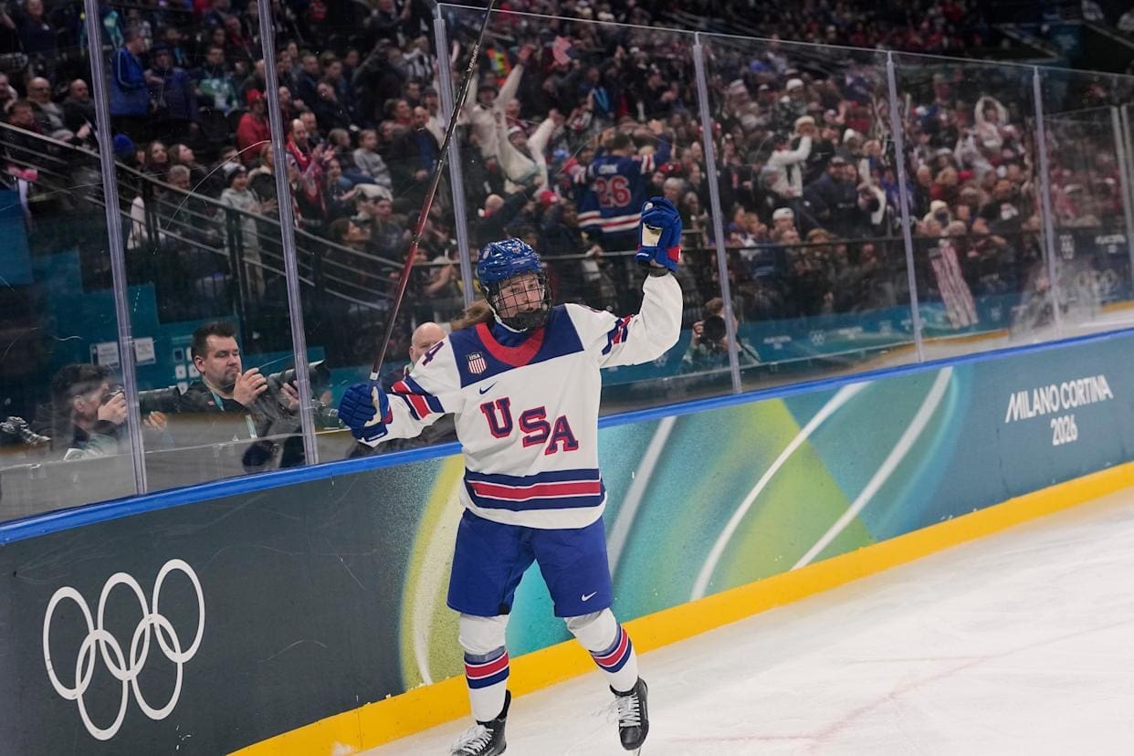 U.S. defenseman Caroline Harvey celebrates after scoring the opening goal against Canada in women’s Olympic hockey preliminary play at Milano Cortina 2026.