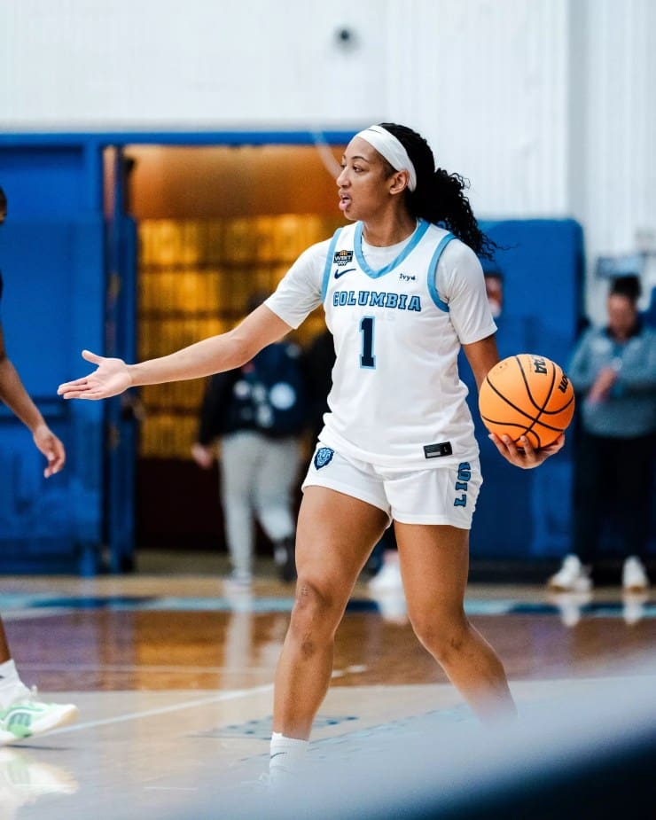 Columbia guard/forward Perri Page directs the offense while holding the ball during a game.
