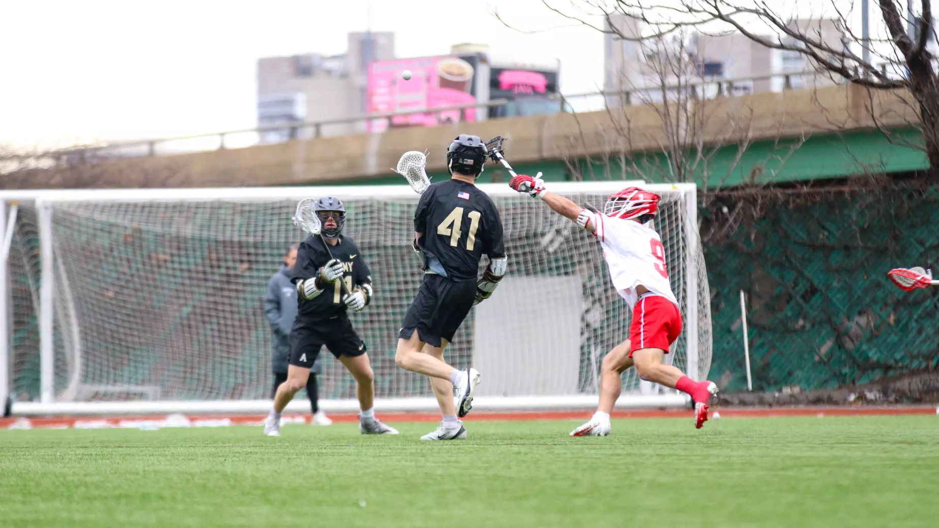 Army attackers Gunnar Fellows and Hill Plunkett drive toward the Boston University goal during a men’s lacrosse game.