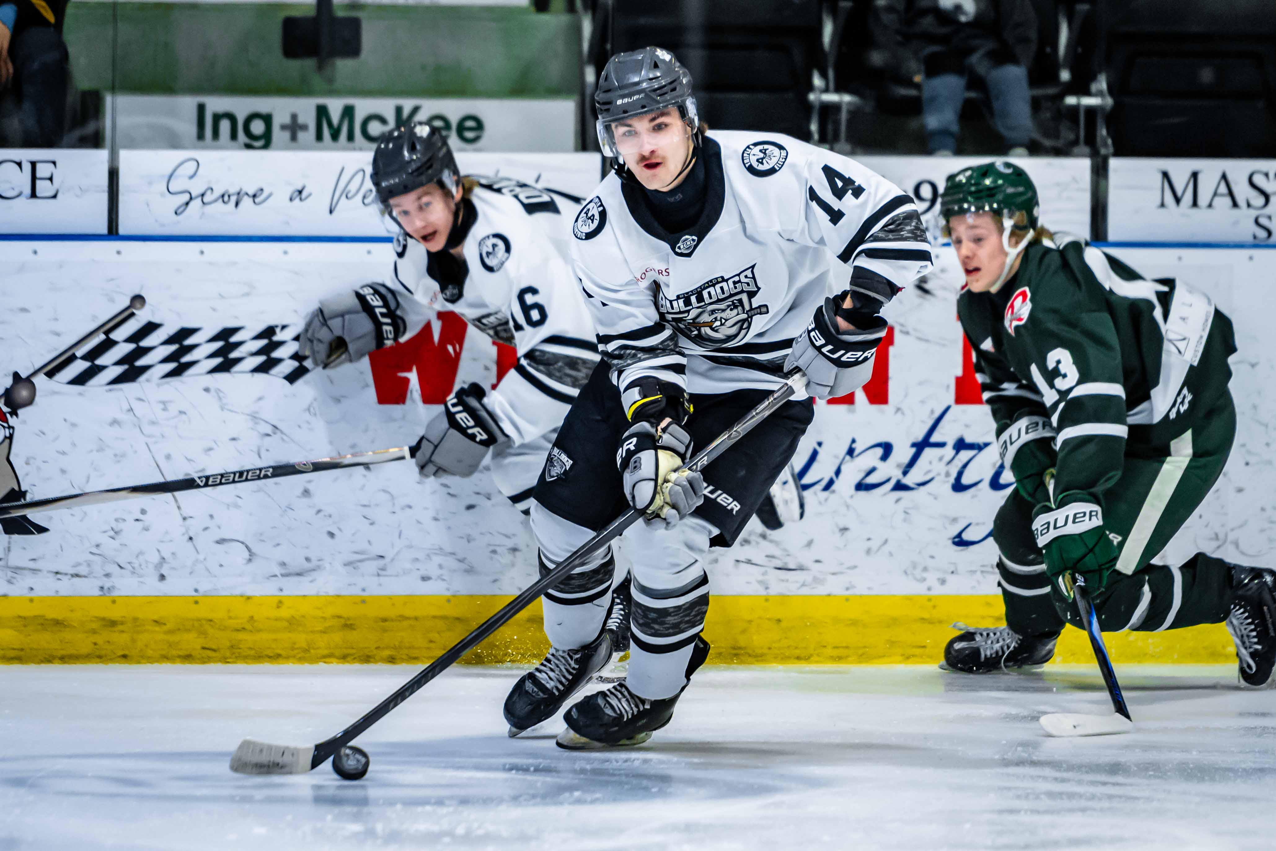 Thomas Neu skating with the puck playing for the Blackfalds Bulldogs; 04/03/25; Photo Credit: Tom Grimsdale/Ideal Images Red Deer