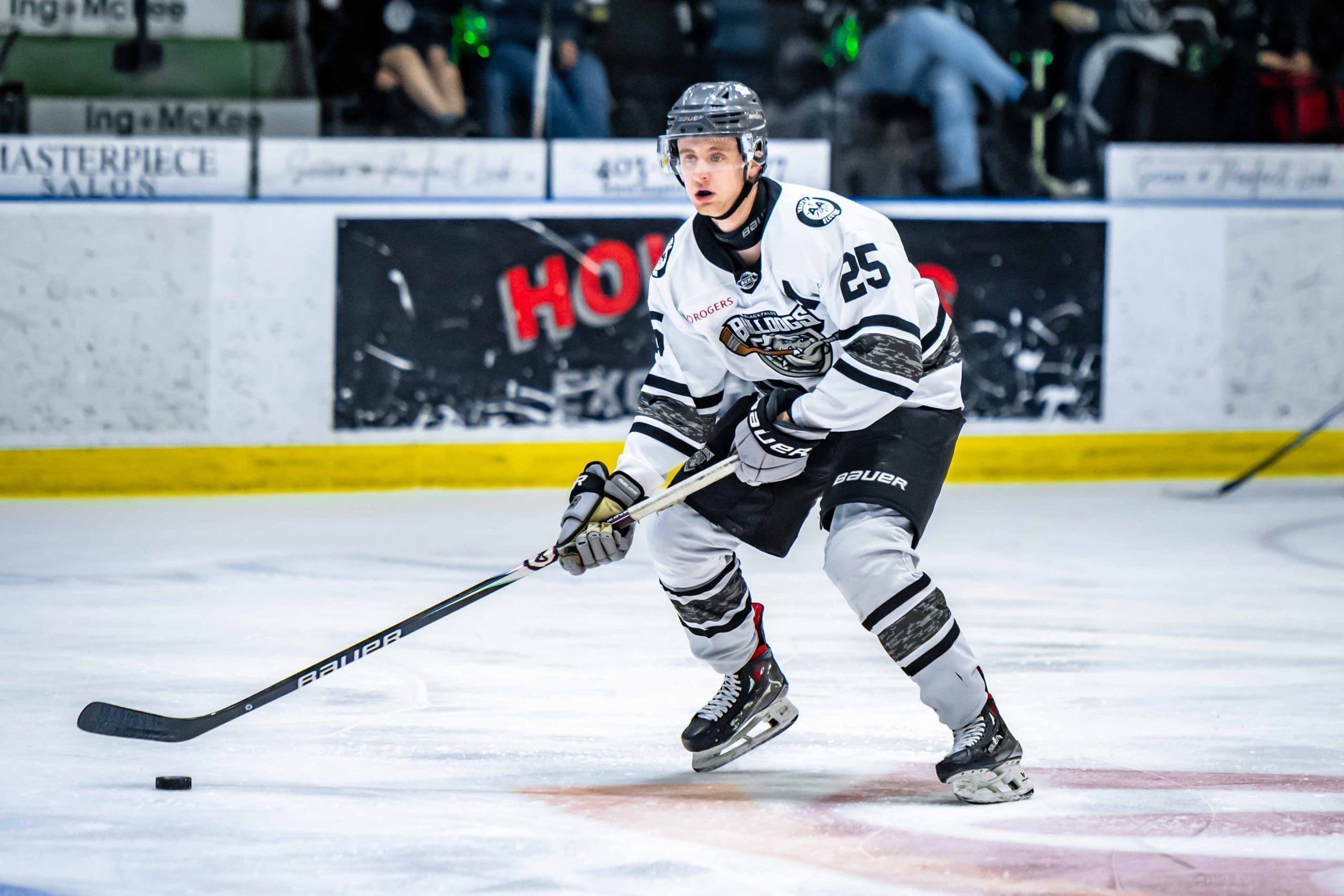 Noah Mertz skating with the puck for the Blackfalds Bulldogs; 04/03/25; Photo Credit: Tom Grimsdale/Ideal Images Red Deer