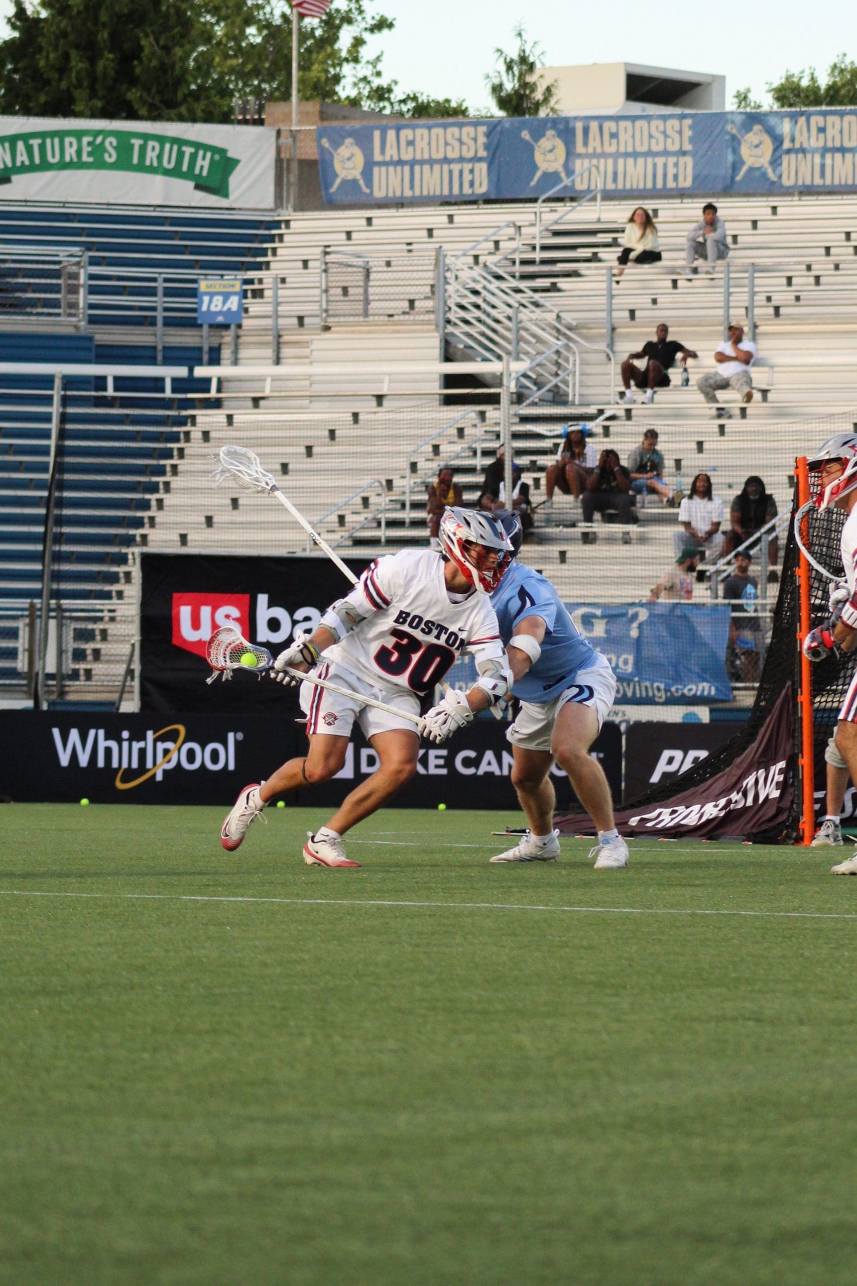 Brian Kelly in his road whites for the Boston Cannon, facing off against the New York Atlas at Hofstra University.